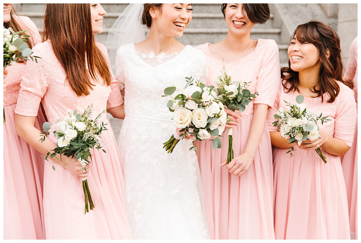 blush bouquets and brides maid dresses