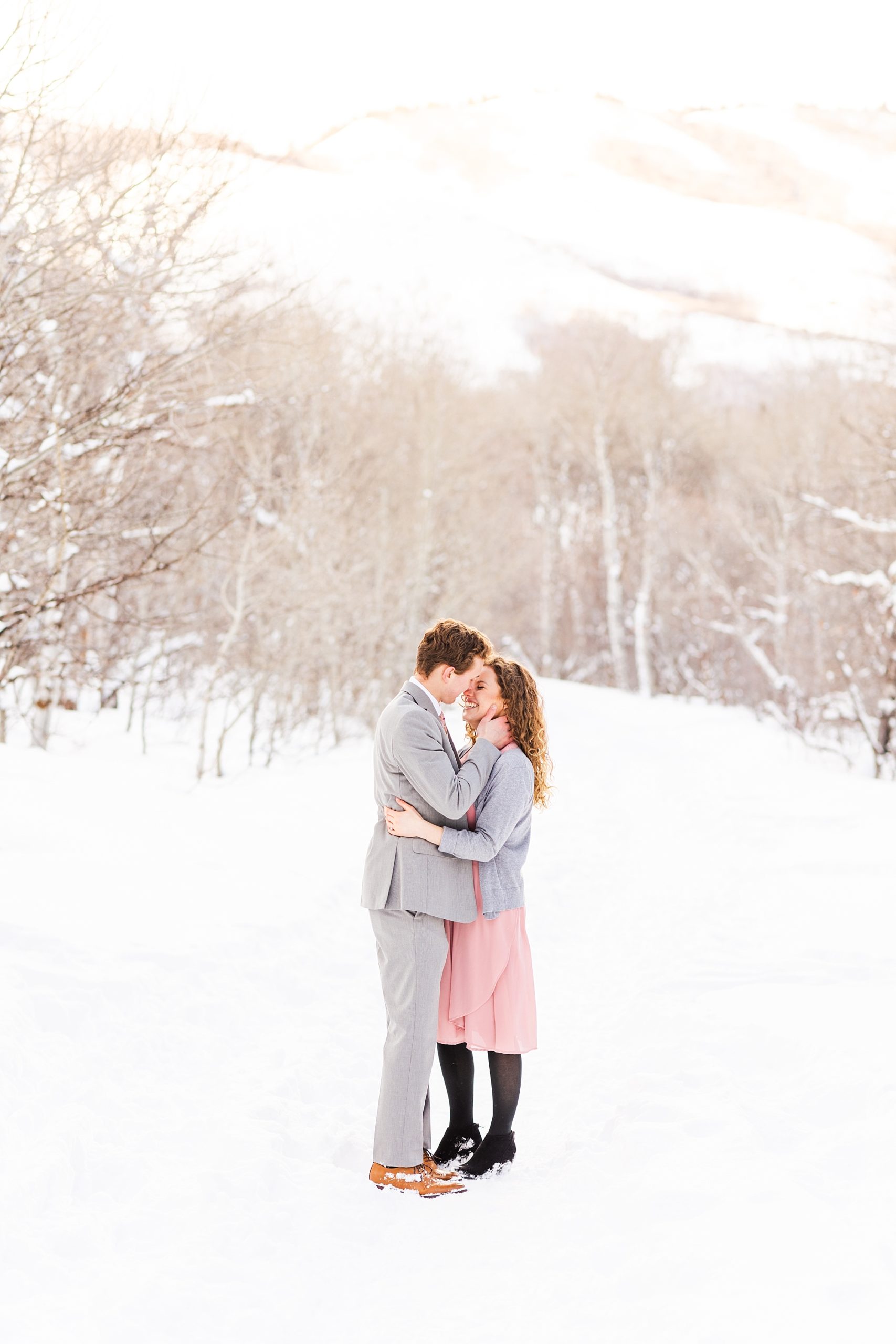 Snowy winter engagement session in the beautiful Utah mountains.