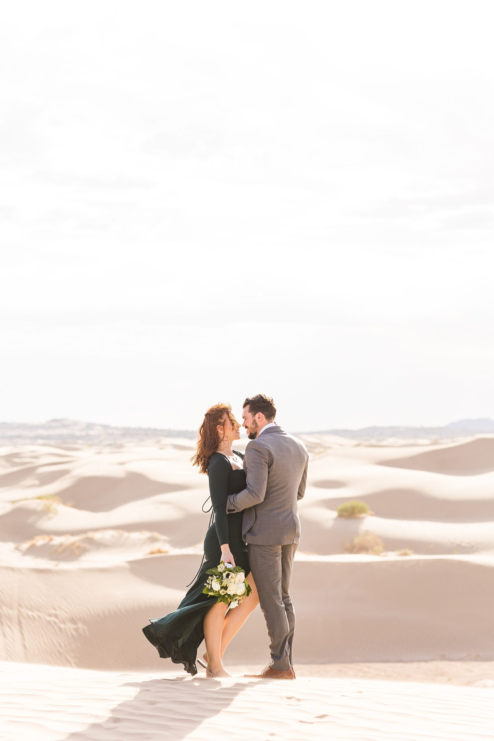With the combination of the mesmerizing views and the sophistication that Ashley and Jonathan brought, their Little Sahara Desert engagement session left us feeling like we had embarked on an exotic adventure. This couple from New York couldn't have chosen a better destination for their engagements! Utah truly has the most diverse and awe-inspiring landscapes. Any kind of adventure you're looking for, we can find it here!!