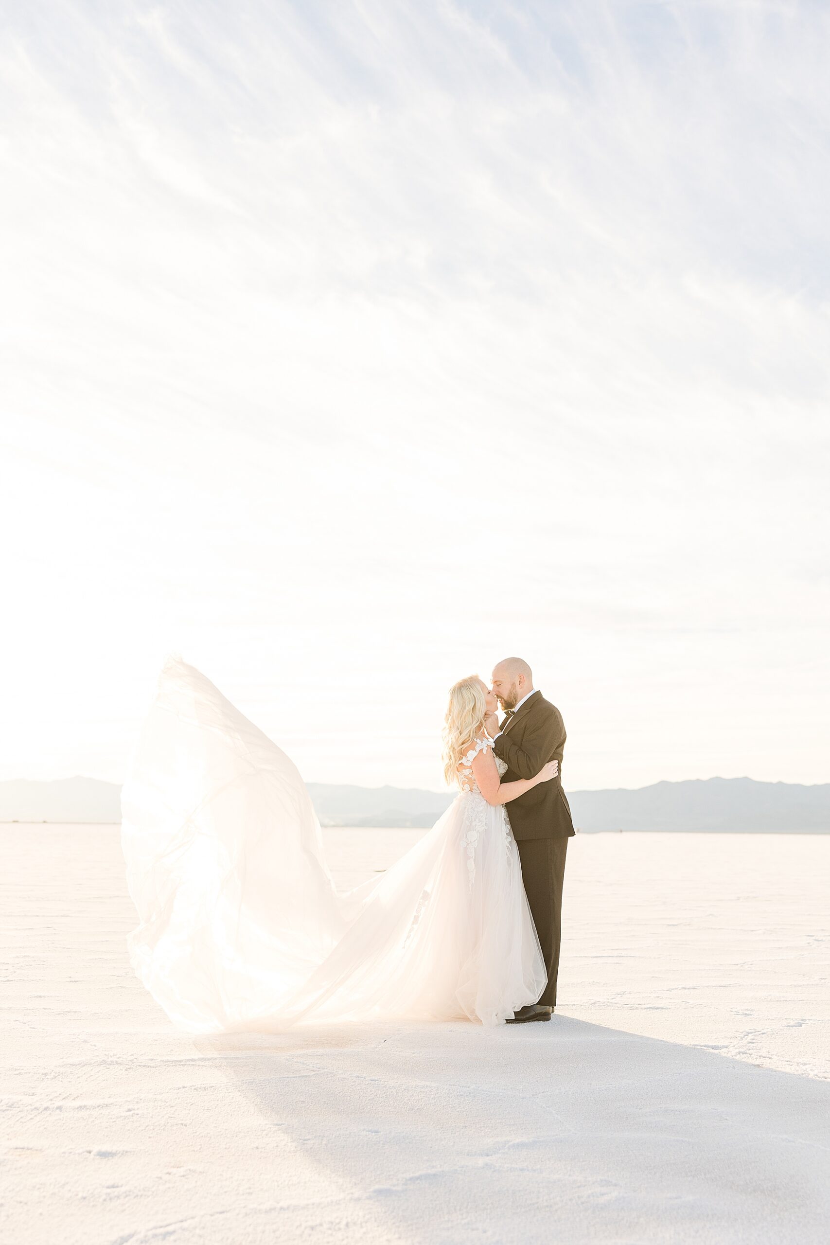 Wedding couple in the soft light of the Bonneville Salt Flats