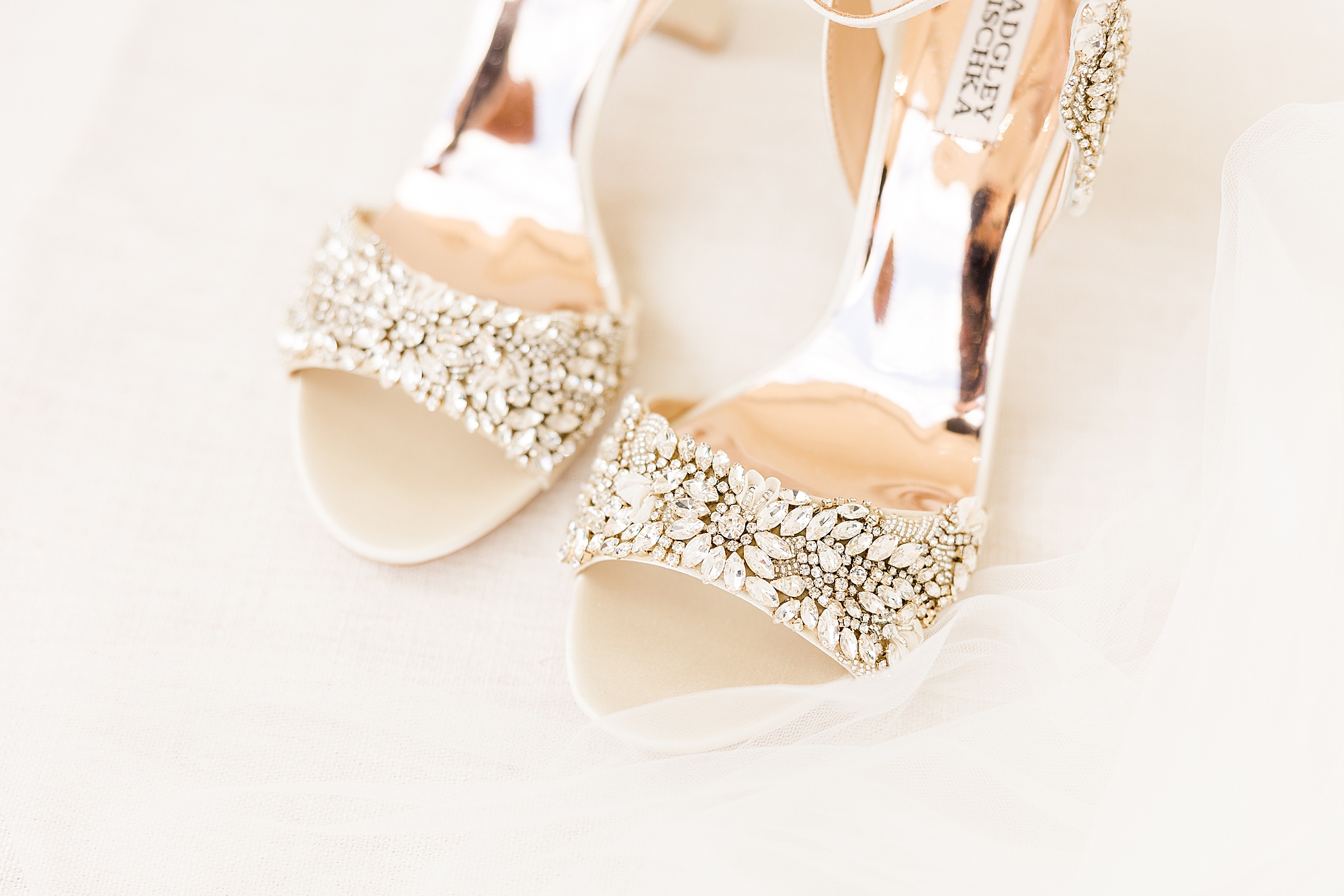 Close-up of the bride's Badgley Mischka jeweled shoes.
