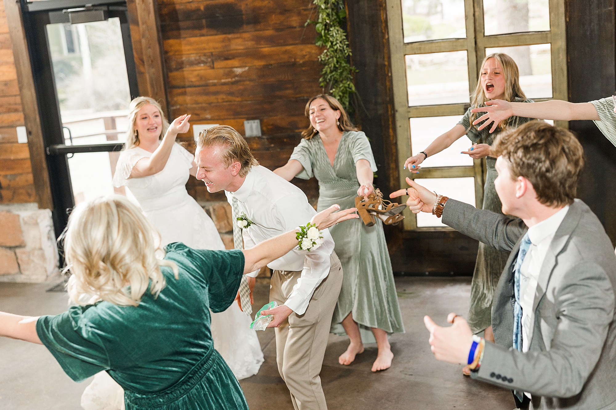 Wedding guests having fun and dancing on the dance floor

