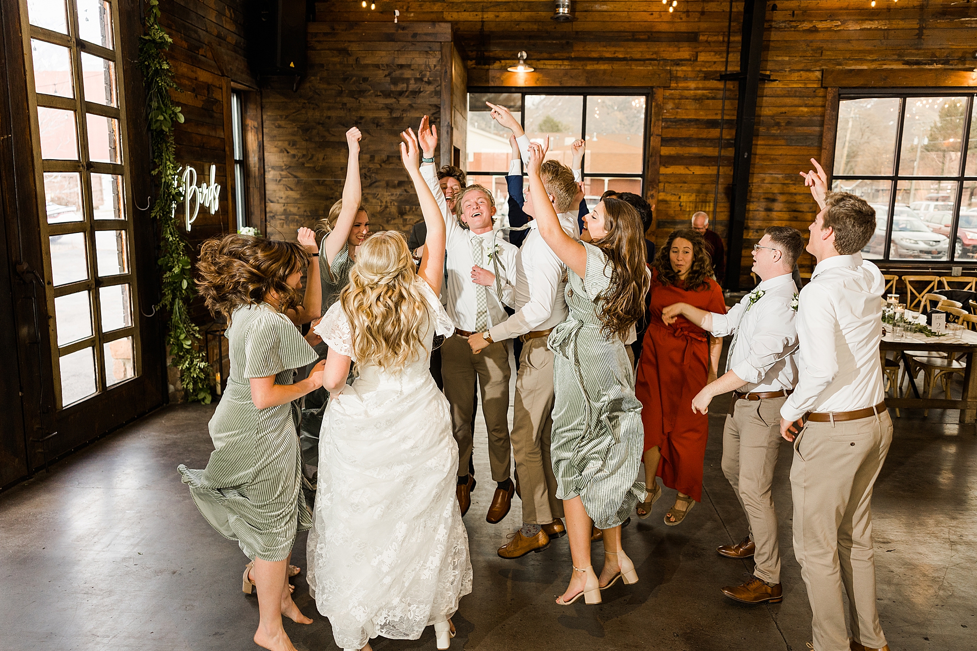 Wedding guests having fun and dancing on the dance floor
